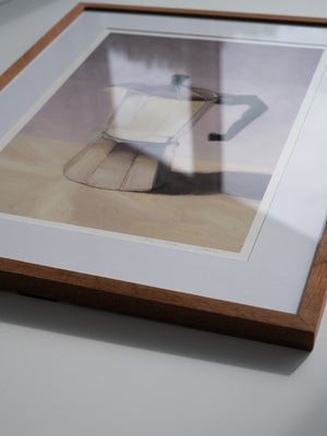 A closeup of a framed hand-signed print