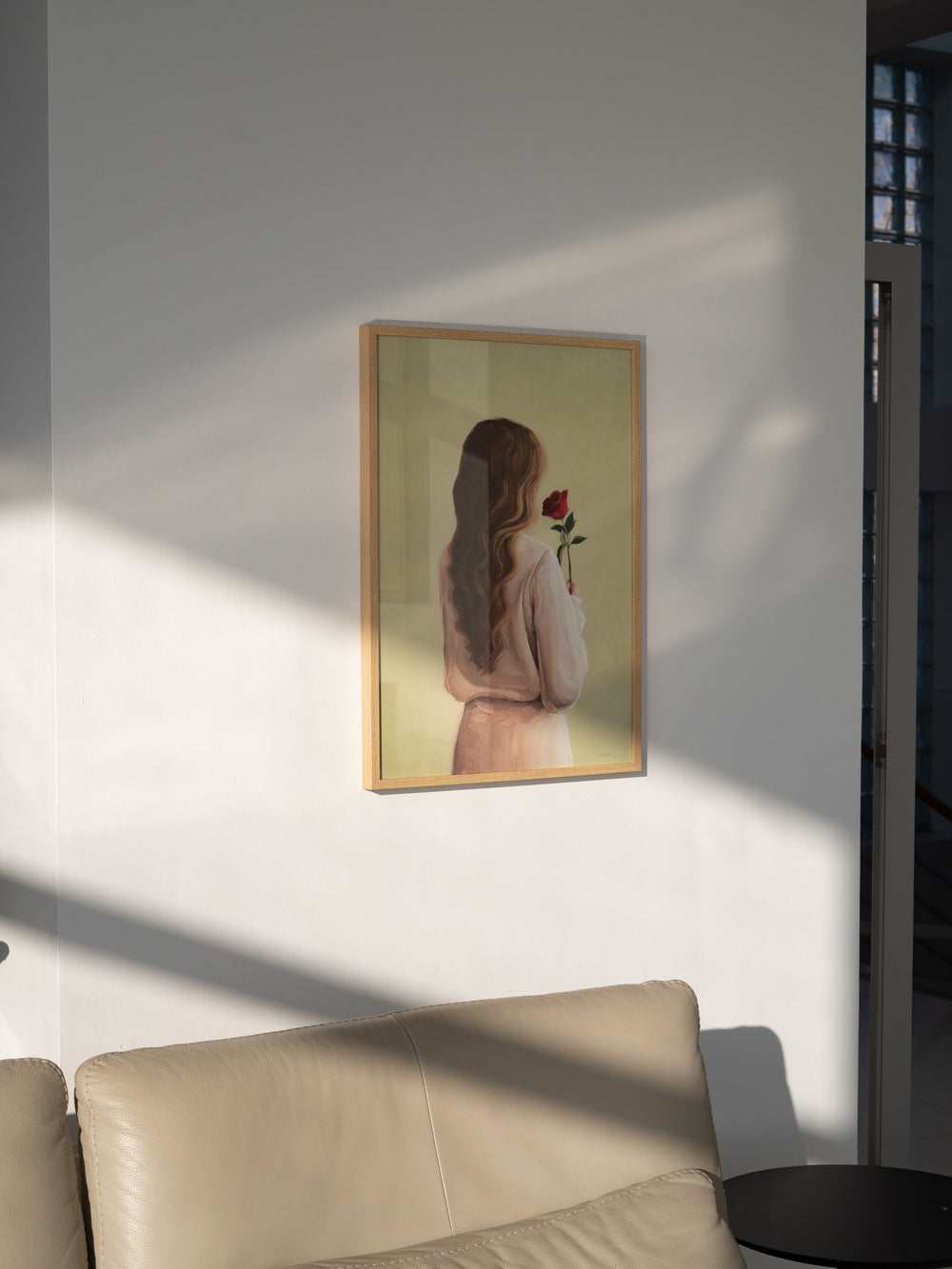 Ar print "Girl With A Rose"  featuring a woman with flowing hair holding a red rose, symbolising love and reflection.