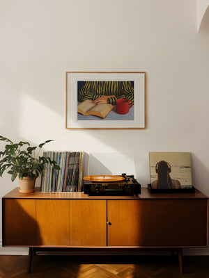 framed artwork featuring booklover