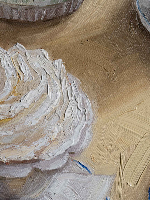 Close-up of a textured painting with white and beige brush strokes.