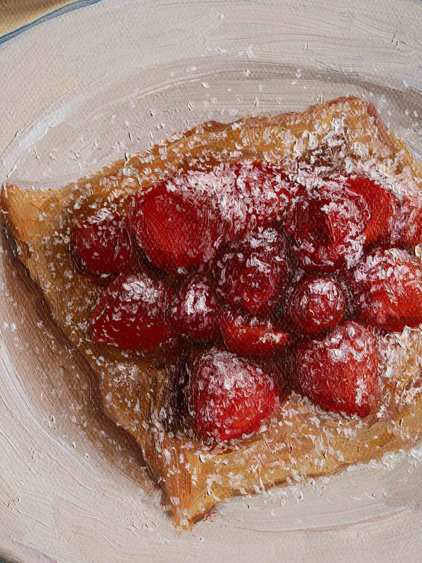 Pastry with berries on a white plate