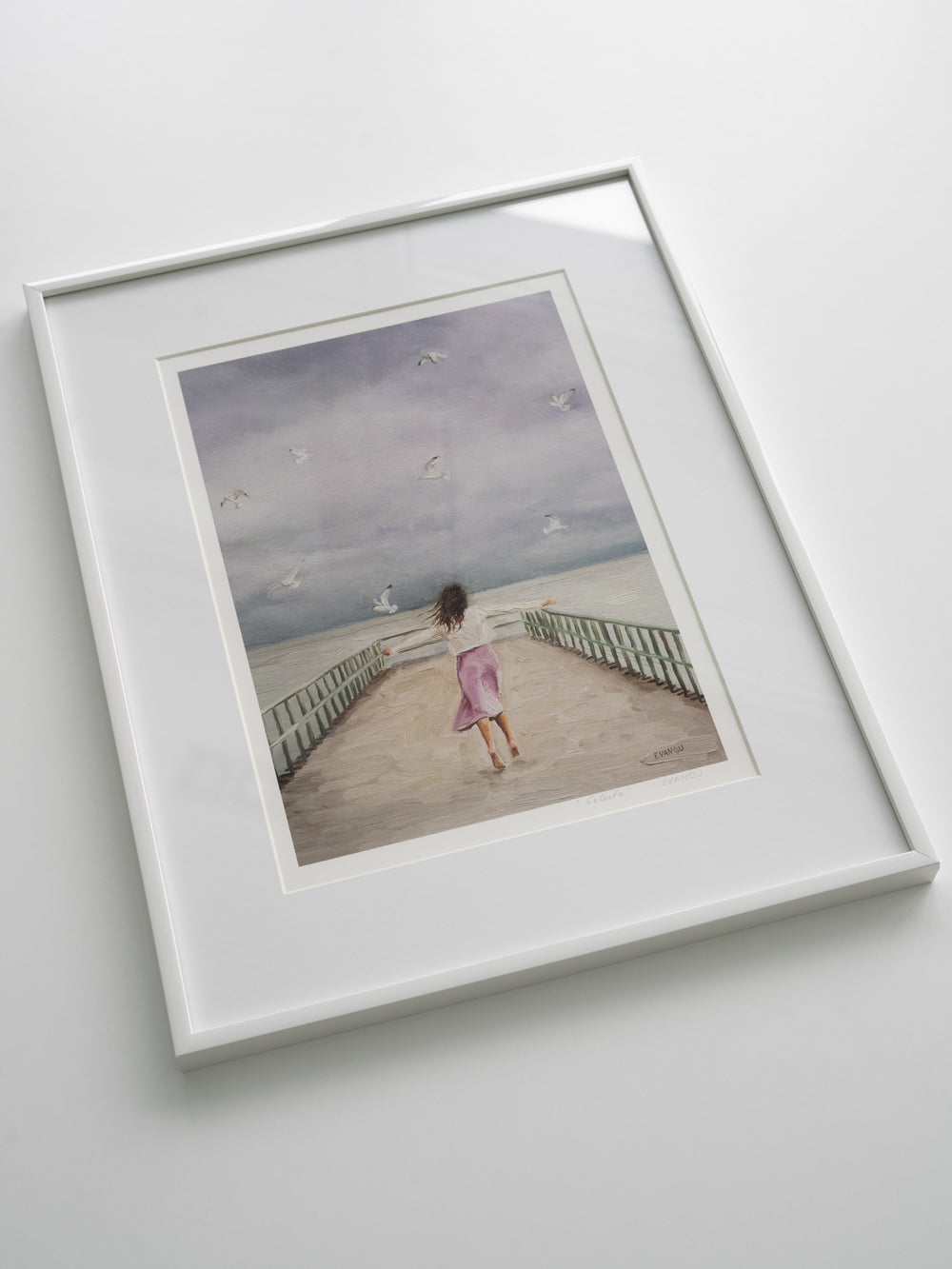Art print of a woman on a pier with seagulls flying above.