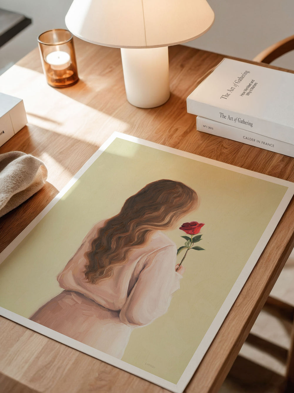 Ar print "Girl With A Rose"  featuring a woman with flowing hair holding a red rose, symbolising love and reflection.