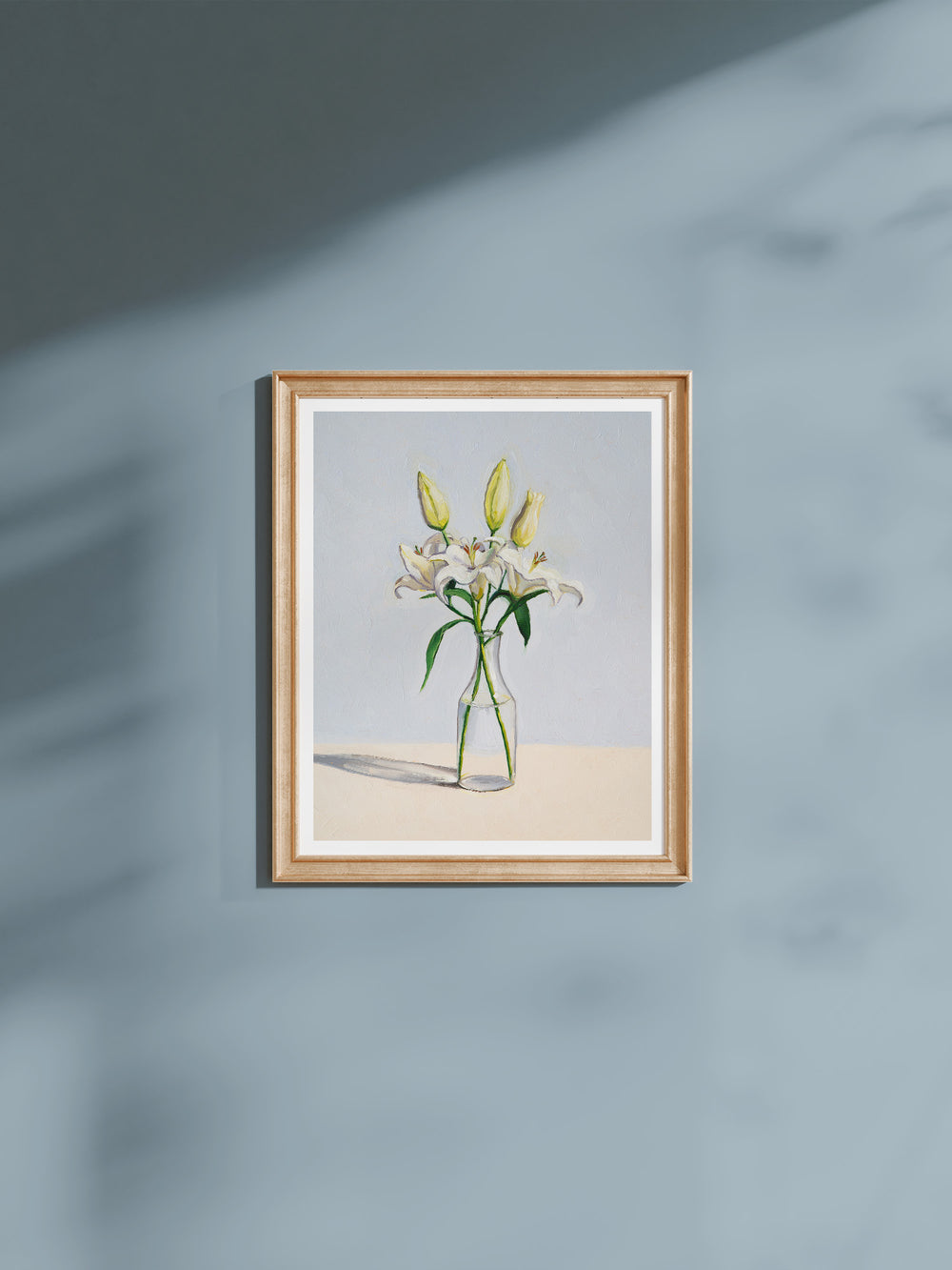 art print featuring white lilies in a glass vase set against light blue background