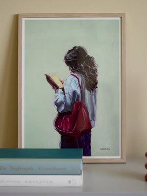 Art print of a woman reading a book from an original oil painting with visible texture